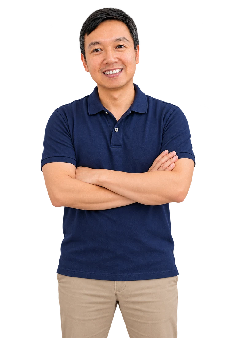 Ton, your Thai teacher, standing with arms crossed